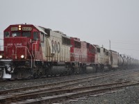 CP 642 led by a trio of SOOs charges thru Tilbury with this ethanol train just as the snow starts to come down heavy. This will probably be one of the last times to see a lashup like this unfortunately.