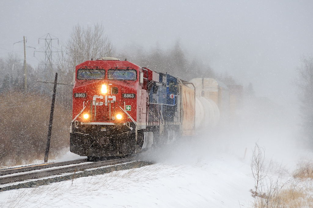 Dashing through the Snow. CP 119-08, led by CP 8863 and CEFX 1050 kick up the snow through Hurkett, Ontario.