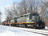 A Quebec Gatineau grain train departs CP\'s St-Luc Yard for Quebec City