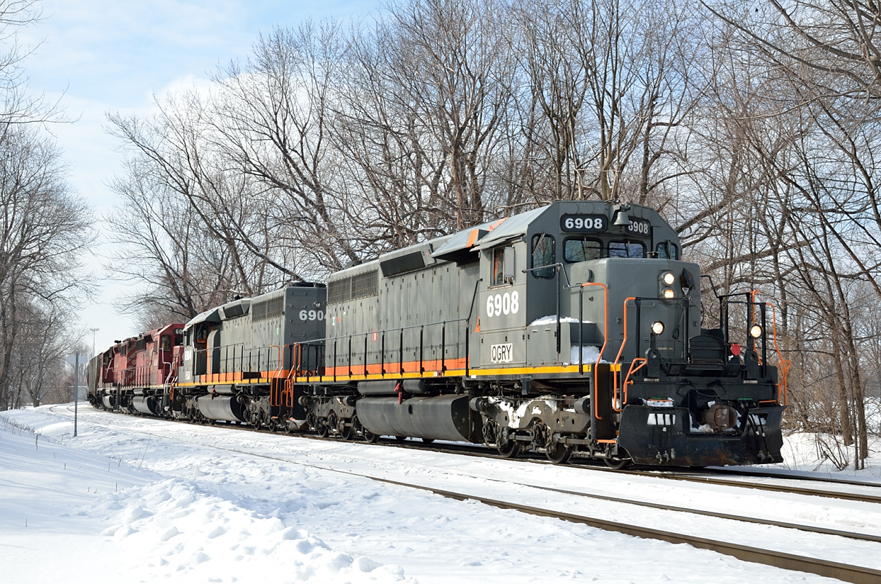 A Quebec Gatineau grain train departs CP\'s St-Luc Yard for Quebec City