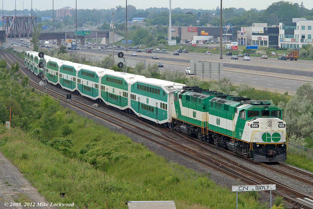 I was driving along the 401 and did a double take when I saw this WB GO Train at Ajax. Raced to Liverpool and parked on the sidewalk for a quick shoot and scoot. I do not think this happened often, and though I received near constant reminders that we had somewhere to be, I\'m not one to pass up a back to back set of F59\'s. GO 555 and 562. 1403hrs.