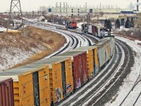 Waiting to lift the racks in Oshawa 8871 and 2236 are passed by 372.