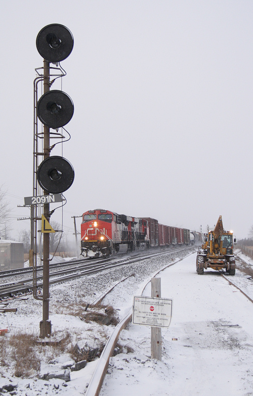 CN M36831 12 crosses over at Marysville ; the searchlight signals will soon be removed from service and replaced by bridge signals