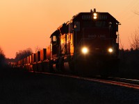 CP 142 chugging out of Killean in the last light of the day