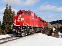 CP 119-18 heads across the Pic River, East of Heron Bay, ON