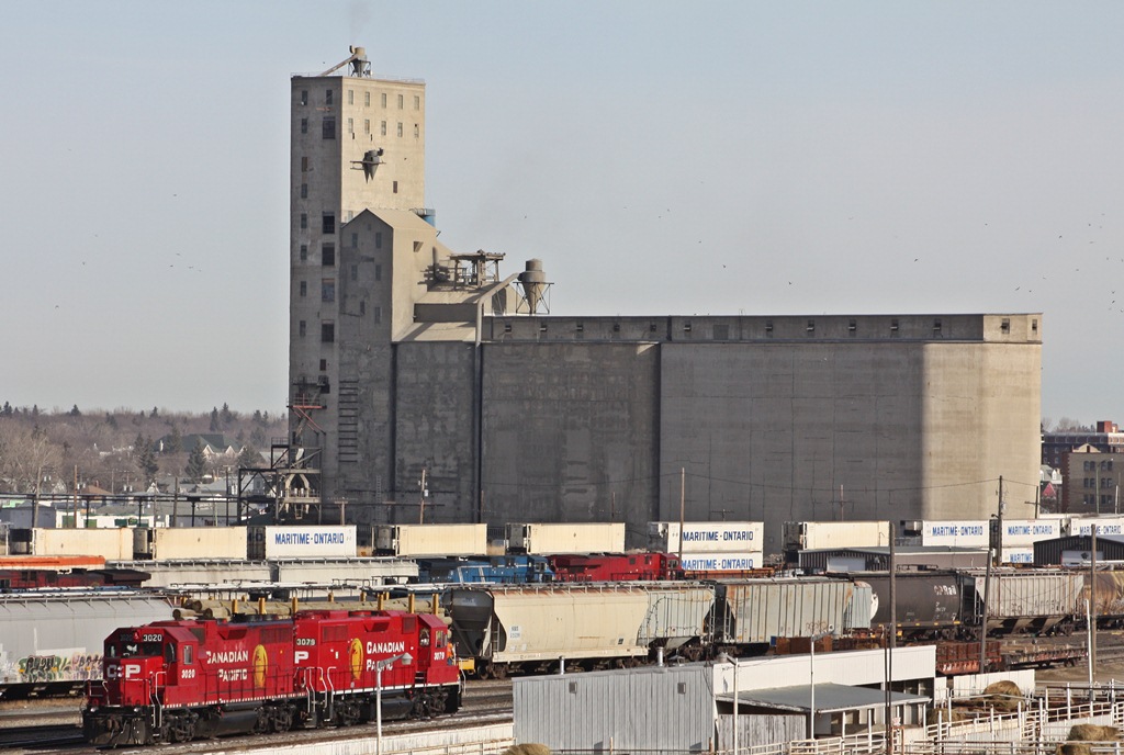 CP GP38AC 3020 and GP38-2 3079 head to the shop tracks after working the west end of the yard.