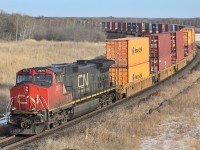 CN C44-9W 2679 is the rear dpu on CN 116 as it heads east out of Rivers.