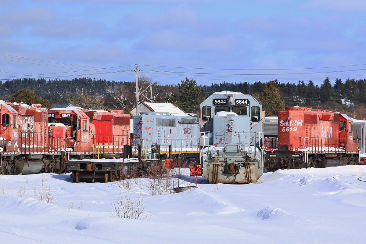 NREX 5644 and other older model ex-Canadian Pacific SD40-2s sit at NRE in Capreol, Ontario.