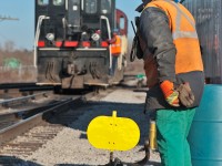 The conductor of the second OSR job watches the power go by after lining the switch into the shop house for storage.