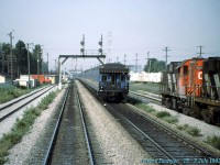 VIA 15 with a business car bringing up the rear.