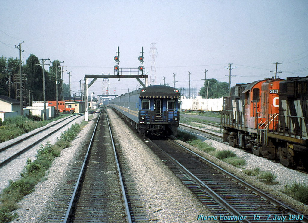 VIA 15 with a business car bringing up the rear.