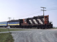 VIA 20 with loaned CN 4364 leading 6631.