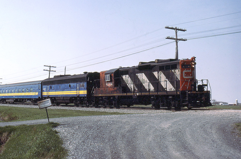 VIA 20 with loaned CN 4364 leading 6631.