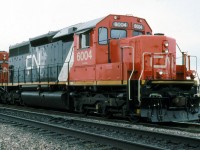 CN 307 stops for a meet with newly rebuilt SD-40u 6004.