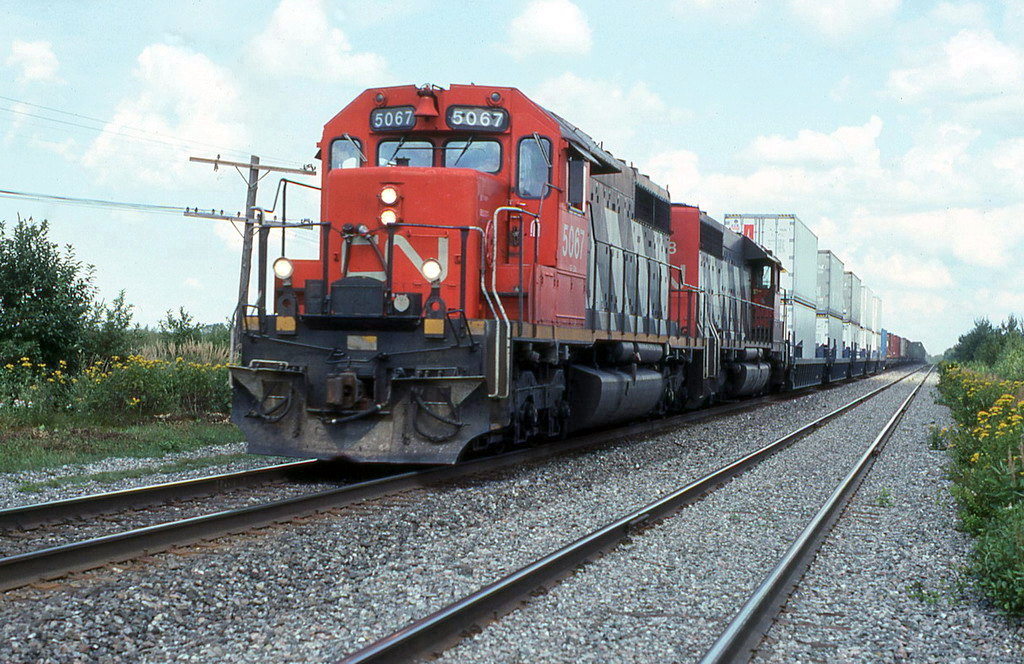 CN 207 coasting downgrade just before the curve and then the horn for the crossing.