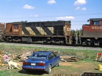 CN 391 with 1750 trailing,an old modified RS-18 with RSC-13 trucks near the end of its career.