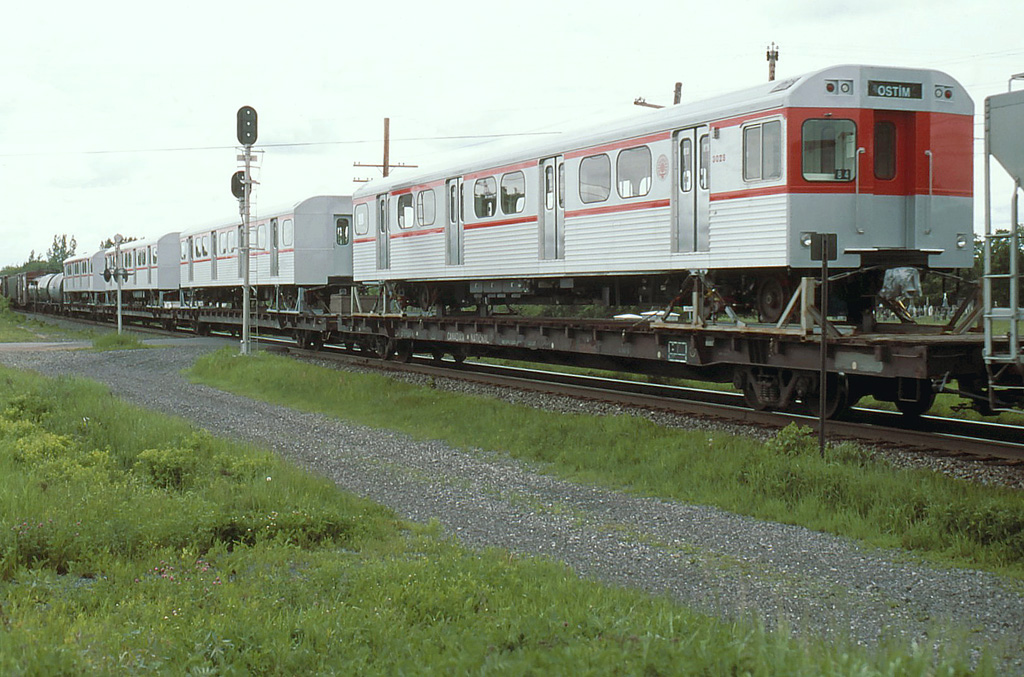 CN 310 with some subway cars to deliver somewhere,I,d like to know where.