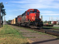 CN 391 just passed the station with a 30 year old SD and a younger GP.
