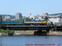 VIA 23 rolls past the old scribbled Wellington tower 3 minutes from the station.