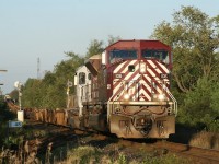 A pair of CEFX units lead 243 westward at Mile 48 on the Galt Sub