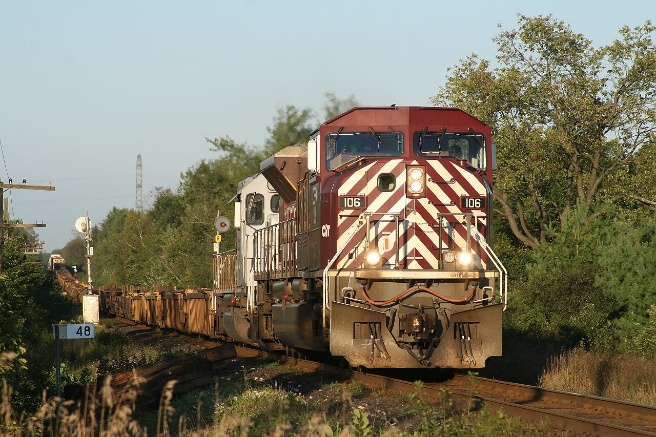A pair of CEFX units lead 243 westward at Mile 48 on the Galt Sub