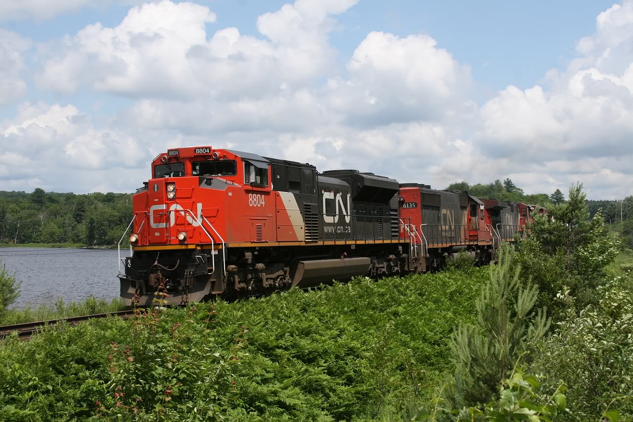 CN 450 skirts Siding Lake after meeting CN 595 at Martins.