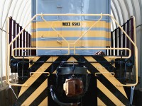 The nose end of CP 6503, a Montreal Locomotive Works S3 switcher built in 1951 and shown here undercover with fresh paint at the West Coast Railway Heritage Park in Squamish.