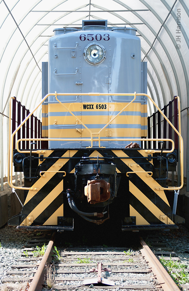 The nose end of CP 6503, a Montreal Locomotive Works S3 switcher built in 1951 and shown here undercover with fresh paint at the West Coast Railway Heritage Park in Squamish.