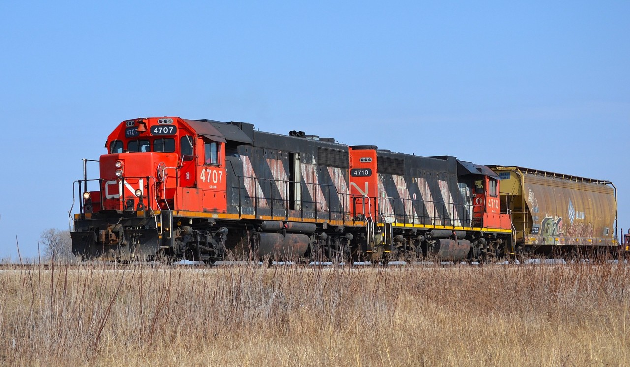 CN 439 led by a pair of GP38-2s, heads westbound towards Jeannettes Creek on its way to Windsor.