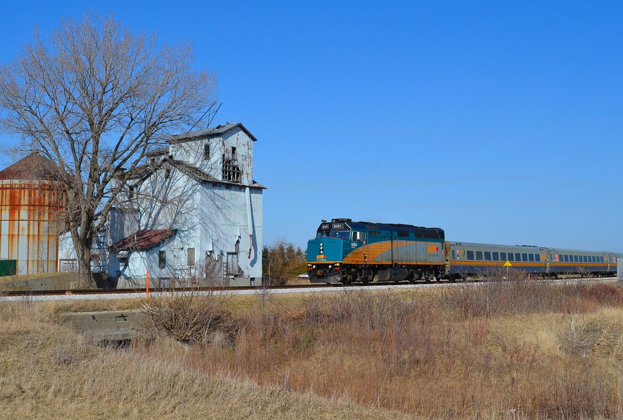 VIA 73 led by 6401 passes by the old grain elevator at Prairie Siding on its way towards Windsor