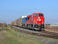 CP 2-241 led by new 9356 & CEFX 1007 hauls this long mixed freight train westbound past the west setoff siding switch at Jeannette. mp 76
