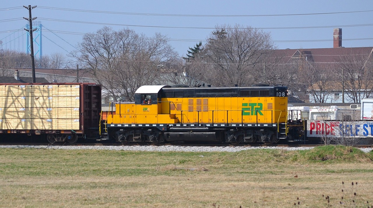 ETR 108, a GP9, heads westbound by College Ave