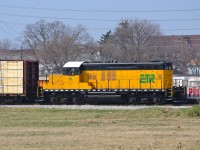 ETR 108, a GP9, heads eastbound by College Ave