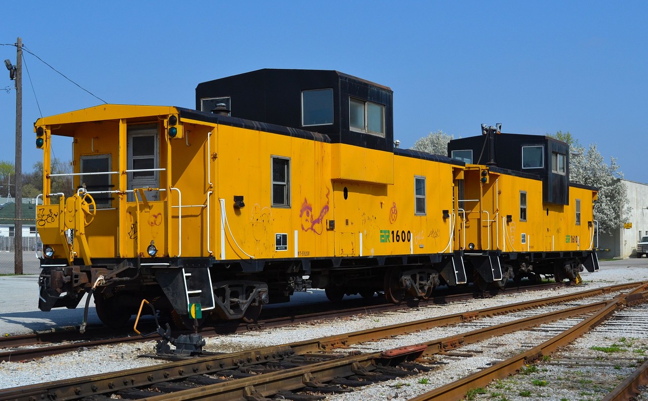 A pair of ETR cabooses no longer in use sit idle in the Windsor ETR yard.