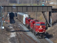 CP 244 led by a trio of GEs, emerges from the Detroit Windsor rail tunnel.