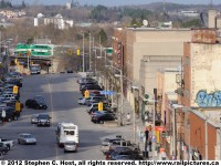 The first commuter train of the day, GO train #207 is entering Guelph from Toronto about to detrain passengers at the improved GO station.