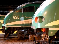 The noses of two GO Transit MPI MP40PH-3C's are tucked away under the train shed, waiting for their departure times on tracks 1 & 2 during evening rush hours.