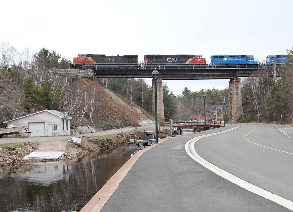 CN 301 heads through Point au Baril, ON ; this train would be photographed in Sioux Lookout, ON and made the 2012 CN Calander!