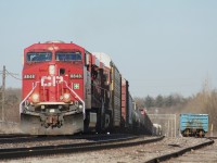 A pair of GEs lead CP train number 424 through Guelph Junction on a warm March afternoon that feels more like May.