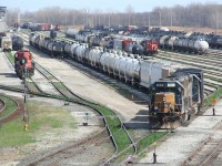 The daily CSX transfer has lifted its cars in CN's Sarnia Yard and is now heading back to their own small yard in Sarnia. CSX has a small isolated operation in Sarnia serving several refineries and petrochemical plants.