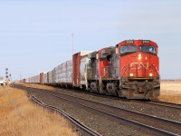 The daily lumber train from Prince George, BC heads for Symington Yard in Winnipeg, Canada