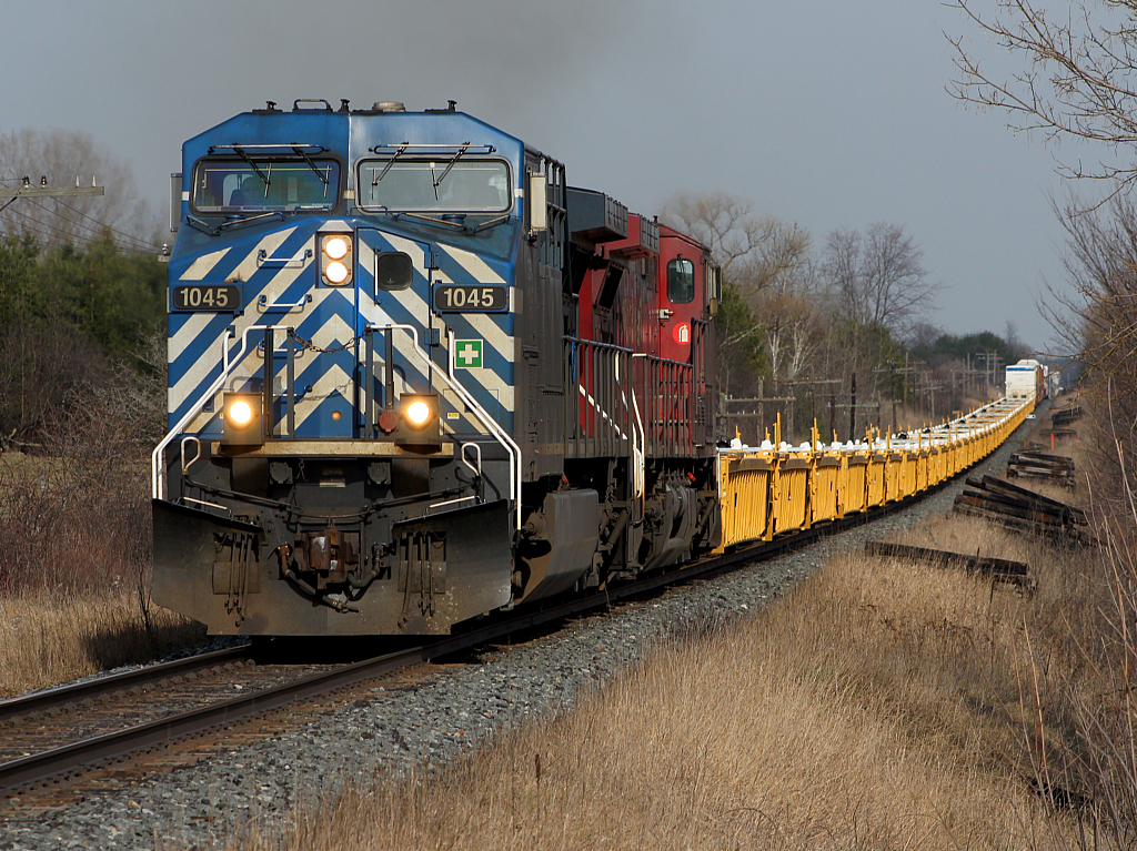 CP 2-241 approaching Killean, with a nice string of well cars on the headend.