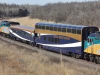 Rocky Mountaineer coaches between two rebuilt F40PH-3's on train number one at Rivers Manitoba.