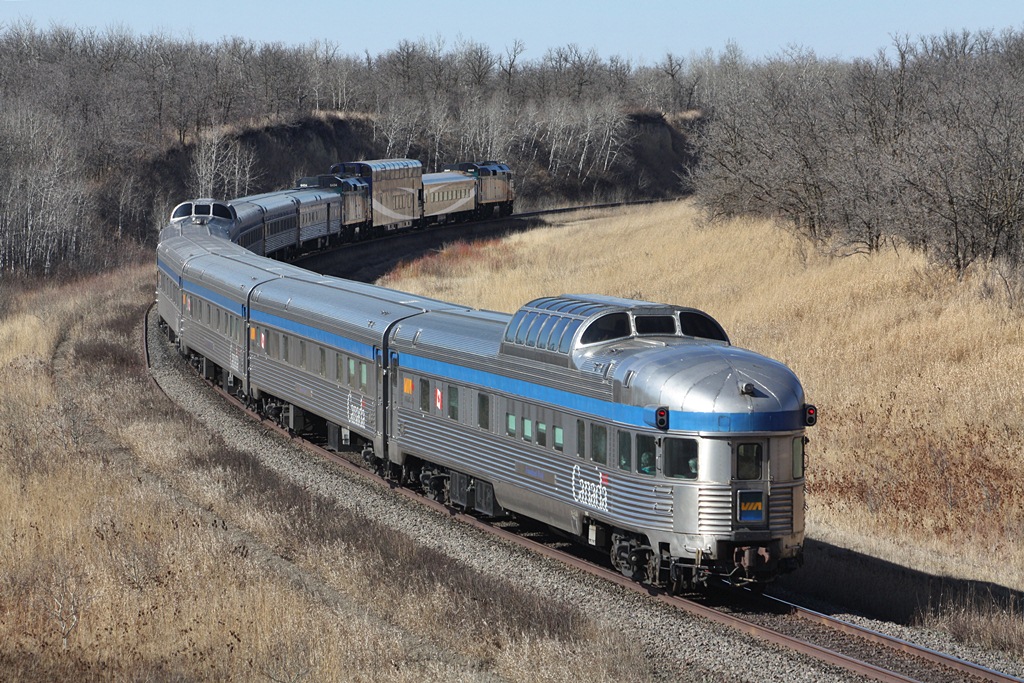 Via Rail\'s Canadian bound for Vancouver heads around the curve into Rivers Manitoba.