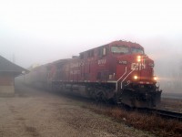 Emerging from the morning fog, CP 440 is passing by the Galt station @ 08:12 with CP 9705 - CP 9655 and 81 cars which included 42 loaded multi's on the head end.