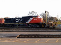 Just after 7:35am the front of CN 2197 is up in the air and everyone has cleared out of the way and I'm able to get a shot of the full unit. The lead truck came off by one of the switches inthe Brantford Yard during the night.