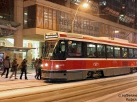 In one of the very few occurances snow actually fell in the Winter 2011-2012 season, we find TTC CLRV 4170 taking on passengers on the 505 Dundas route at Bay Street. While new subway car deliveries are progressing, not a single new streetcar/LRT has been delivered, and the fleet of 1970/1980's CLRV’s and ALRV's is for the most part very intact. As for the snow, it was all melted 2 days later.