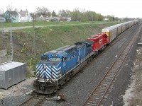 CEFX 1006 and Freshly rebuilt CP 6254 heads towards the CASO Detroit River tunnel on CP train 235.