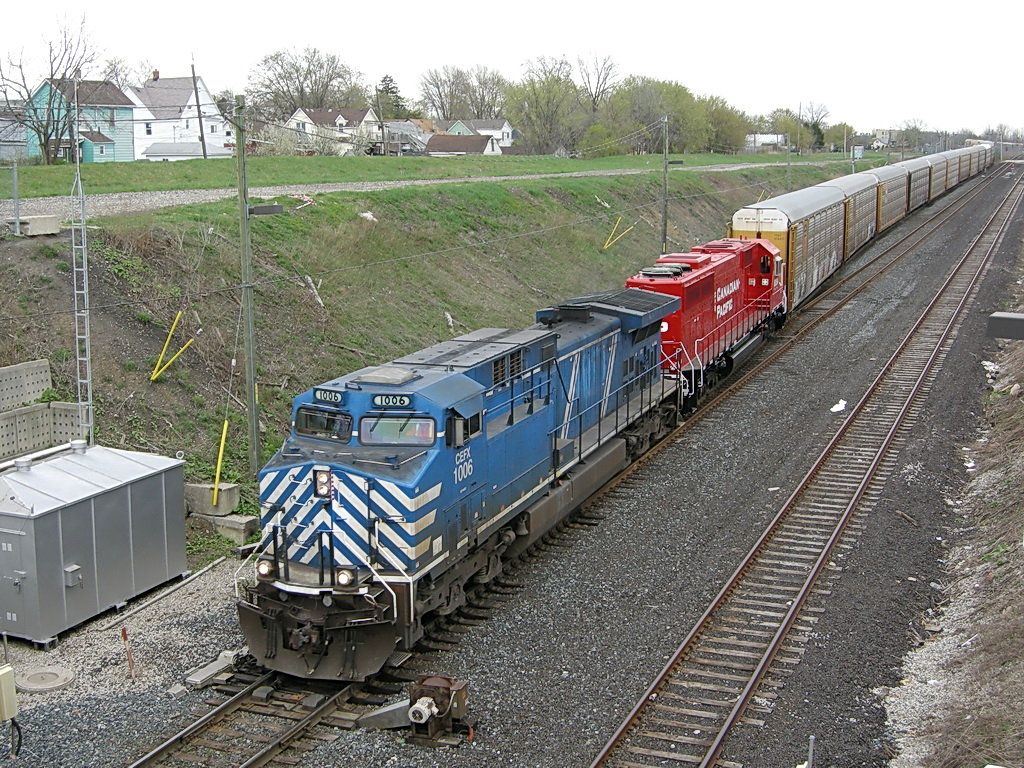 CEFX 1006 and Freshly rebuilt CP 6254 heads towards the CASO Detroit River tunnel on CP train 235.