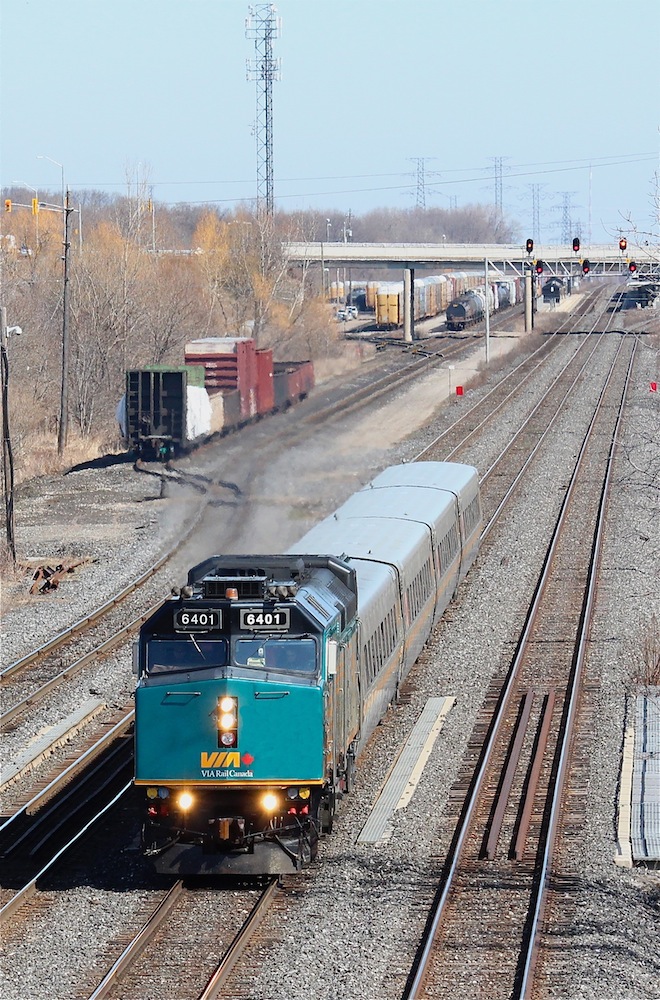 VIA 6401 leads train 73 westbound under Lemonville Road on its way to Windsor.